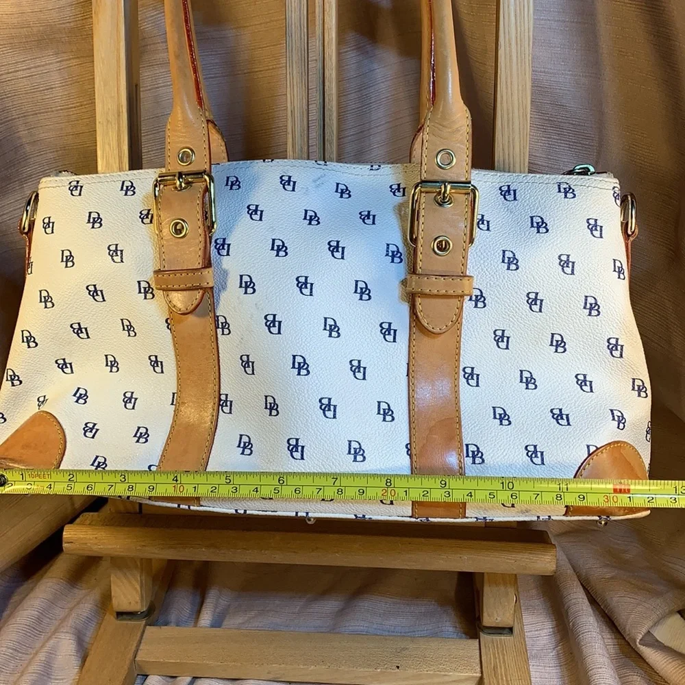 Dooney & Bourke leather satchel w/logo pattern